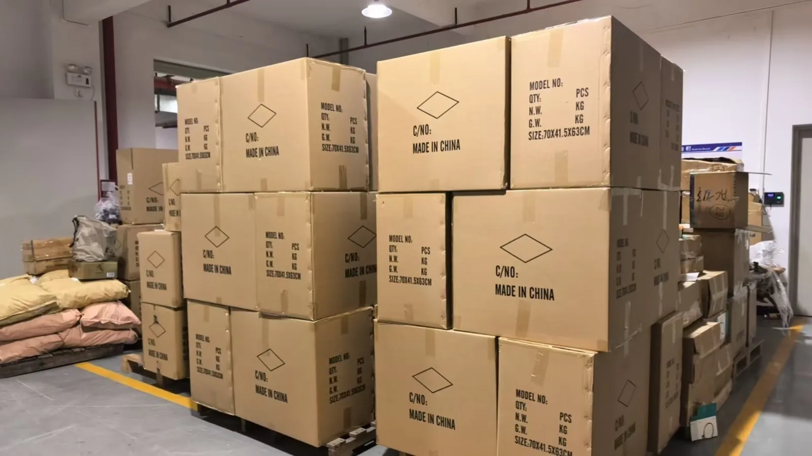 Finished-goods warehouse with export cartons at the Shenzhen Meiwang factory